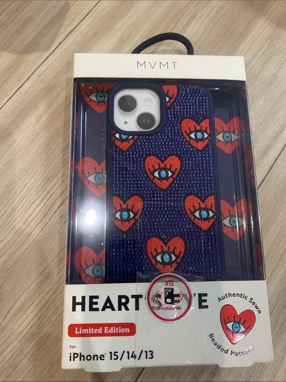 MVMT Purple Beaded Phone Case with Red Heart Eye Pattern